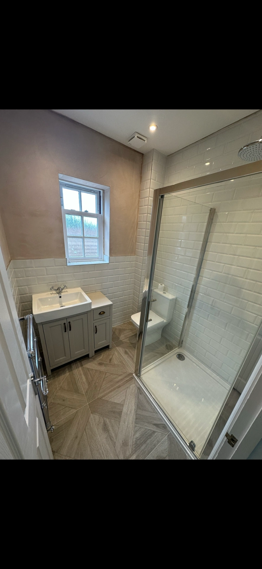 Traditional cloakroom shower room with grey shaker vanity, metro tiles and parquet floor — bathroom renovation Woking